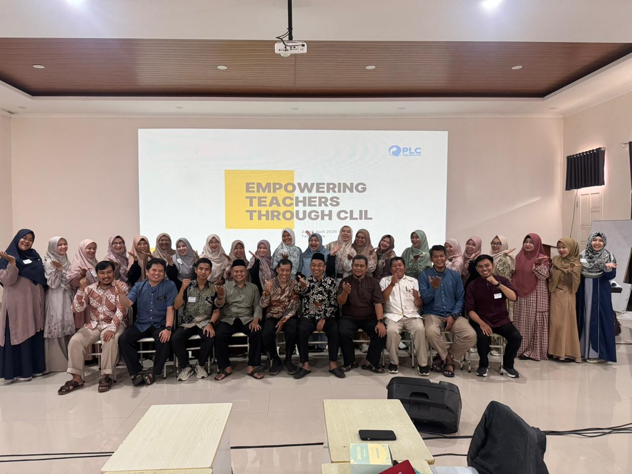 Group photo of 29 educators after completing bilingual teacher training